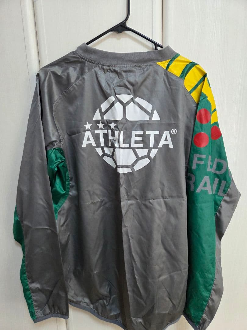 ATHLETA ピステ・ウィンドブレーカー グレー/グリーン