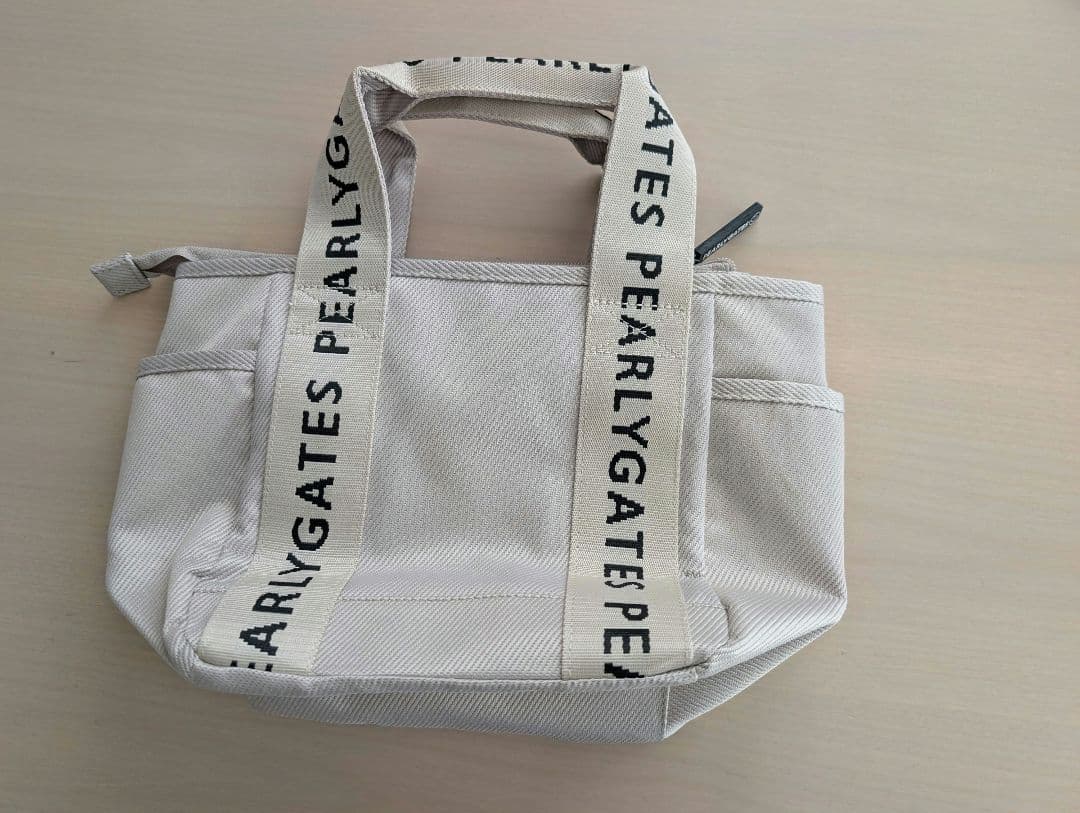 新品　PEARLY GATES ベージュ カートバッグ　ラウンドバッグ