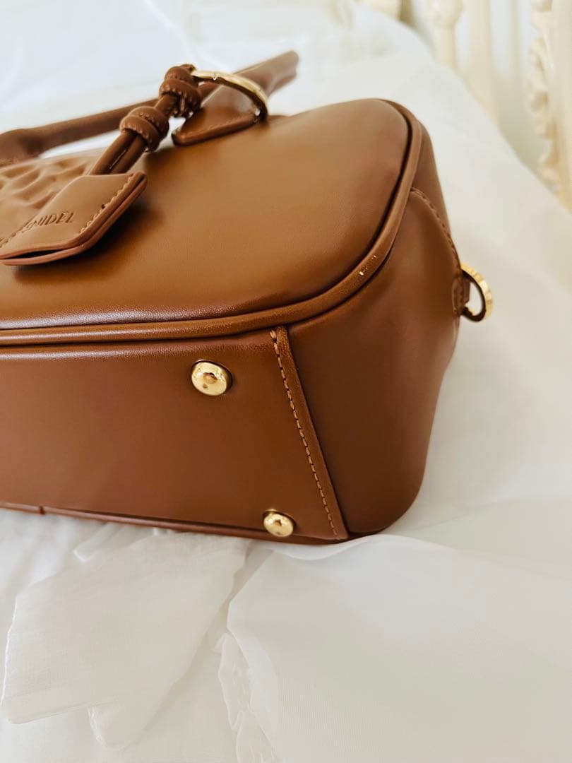 スナイデルエンボスロゴバッグブラウン美品