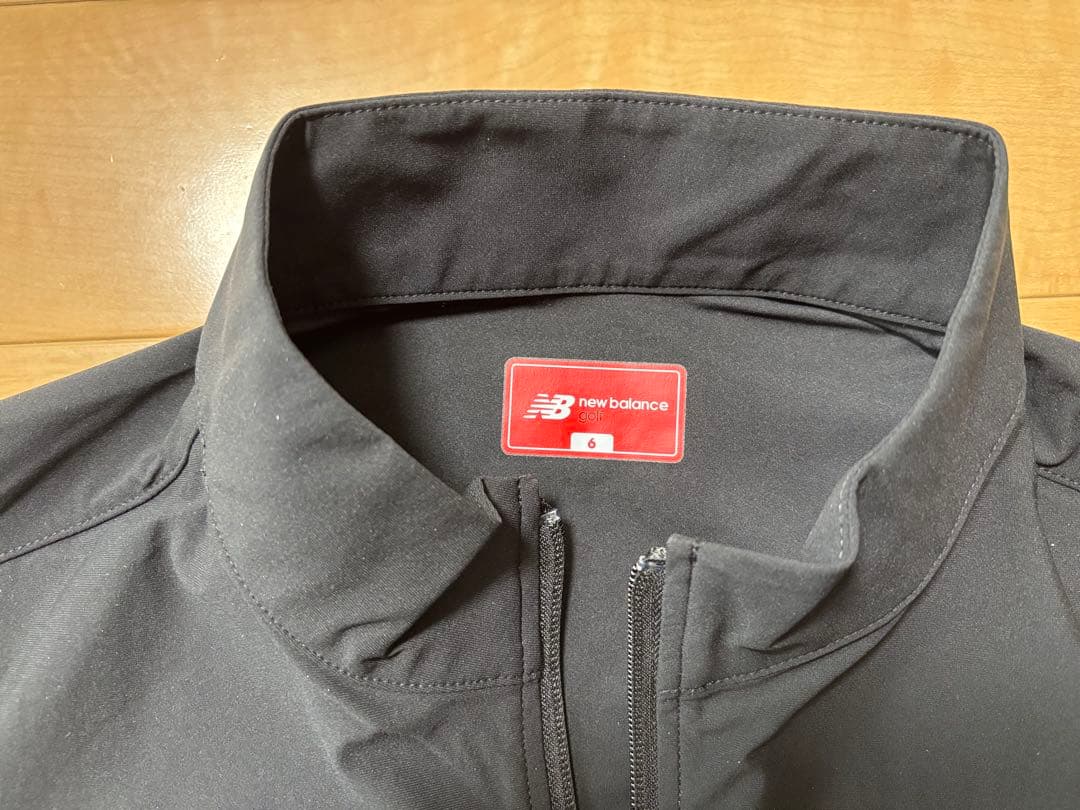 new balance ハーフスリーブ スタンドジップ プルオーバー