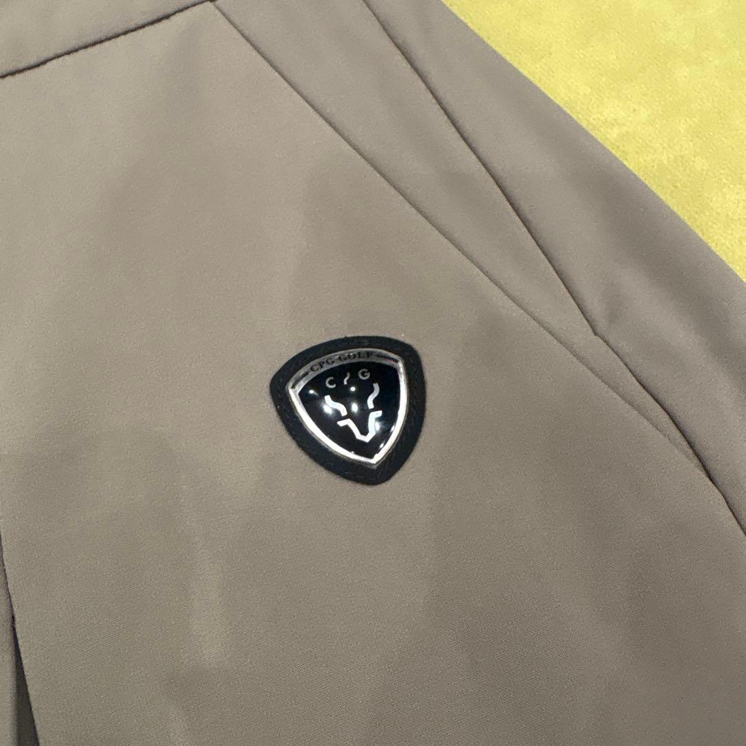 CPG GOLF ベージュ プリーツスカート風ショートバンツ エンブレムロゴ付き