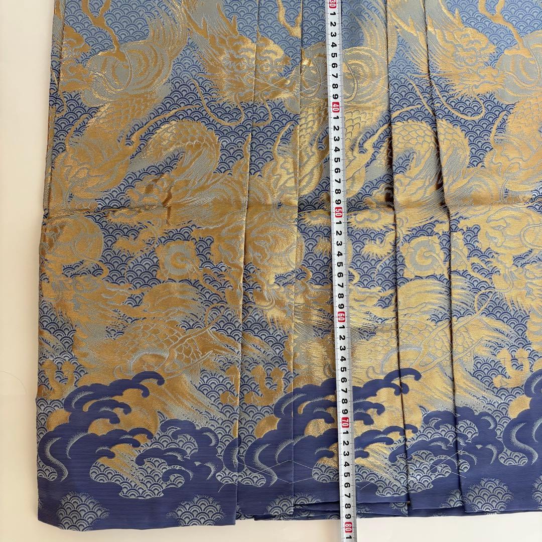 (7-138)馬乗袴　2尺1寸　水色　龍柄　金