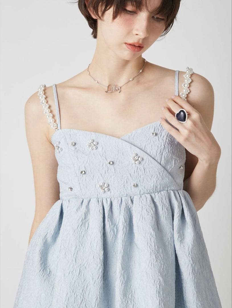 LILY BROWN ビッグリボンビジューペプラムトップス