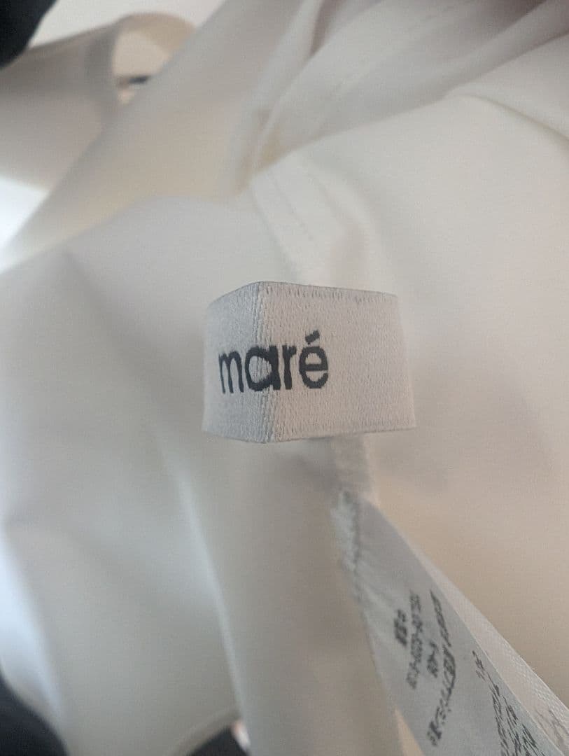 mare フレアデザイン長袖トップス