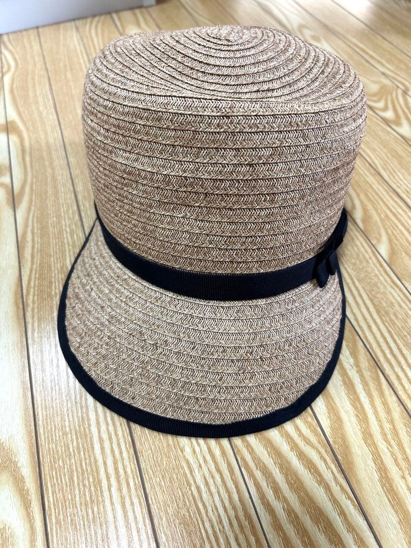 ベージュ ストロー ボーラーハット 黒リボン付き