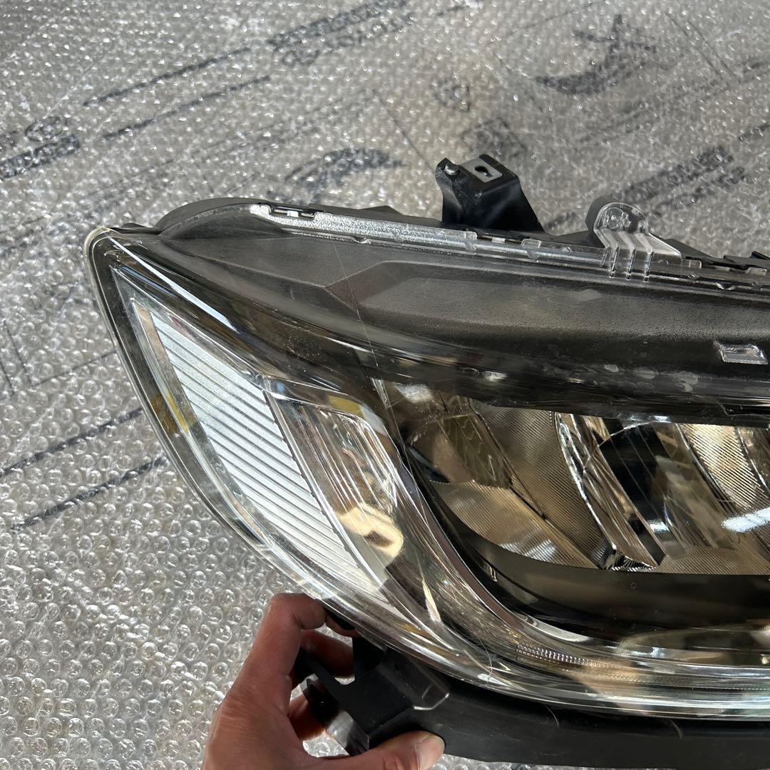 フィット　ヘッドライト　右　STANLEY W3674 ジャンク品