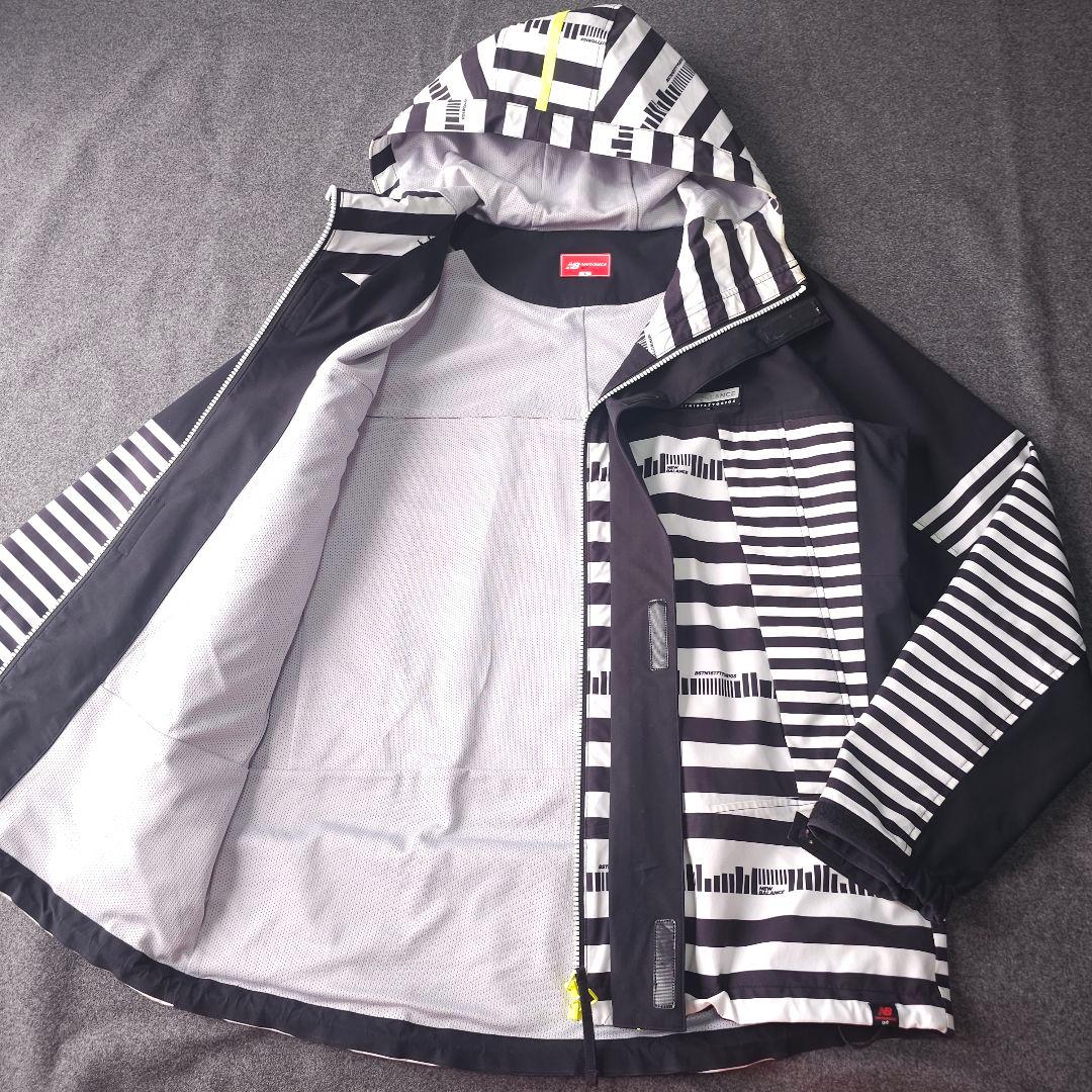 ニューバランスゴルフ 6 XL 撥水ブルゾンジャケット フード 総柄 黒