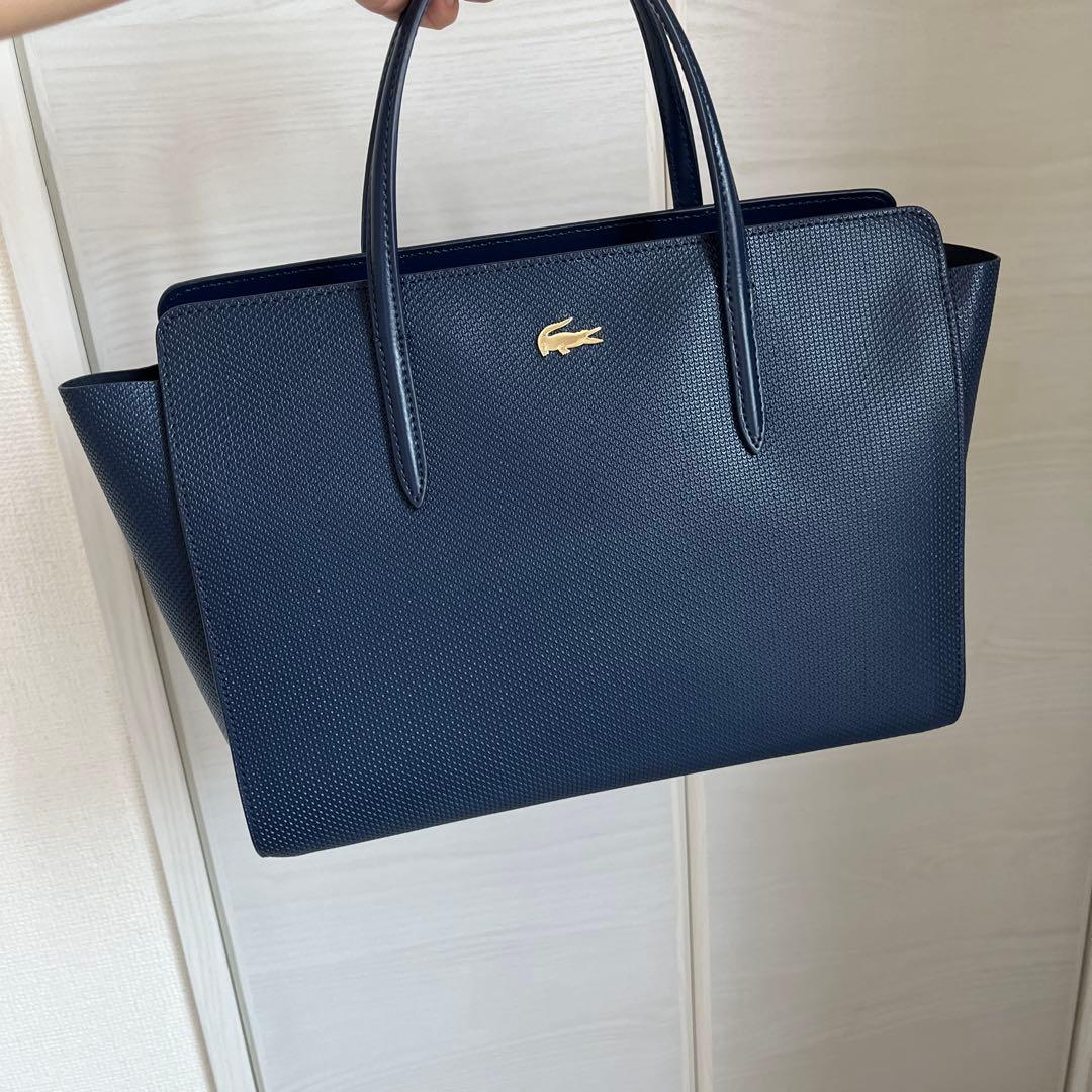 値下げしました！LACOSTE ネイビー バッグ 収納袋付き