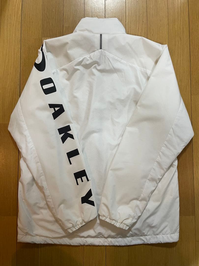 【美品】OAKLEY オークリージャケット L ホワイトフルジップ メッシュ裏地