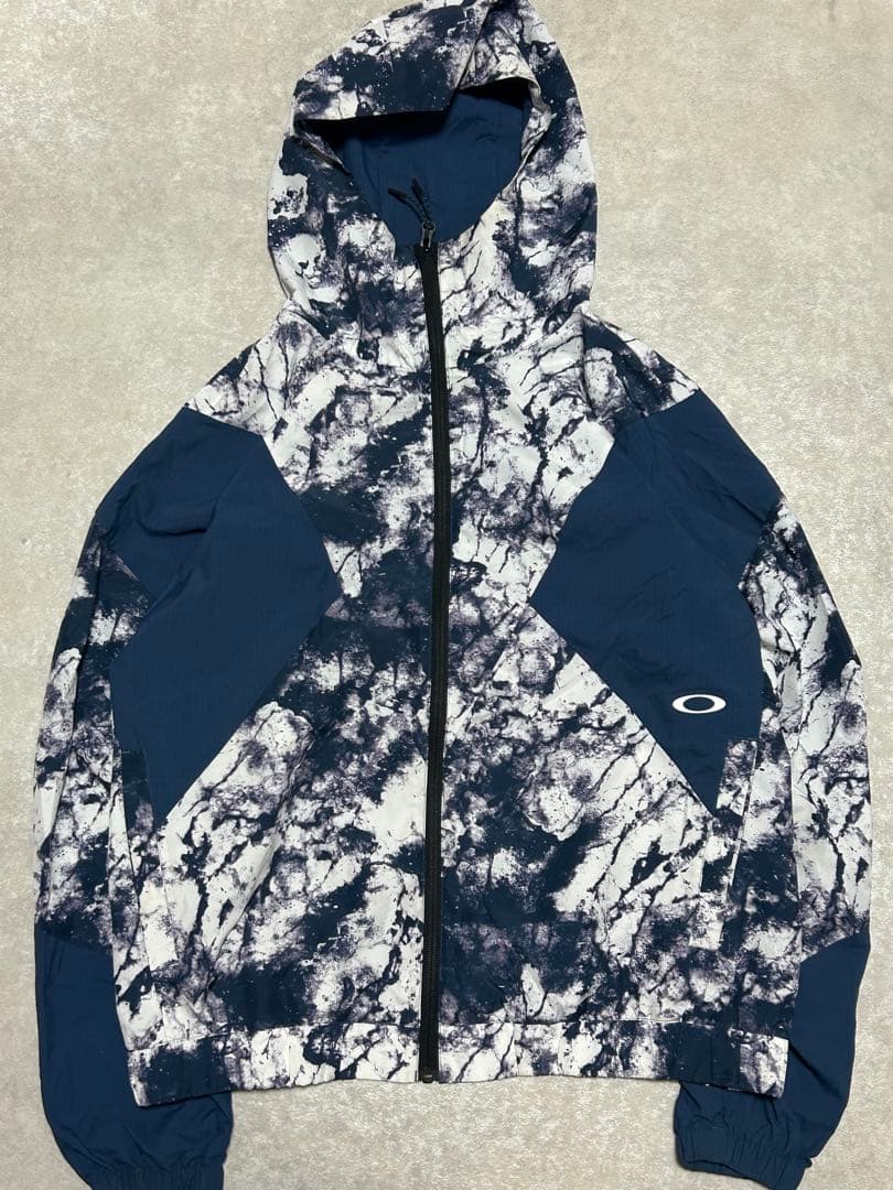極美品 OAKLEY ENHANCE GRAPHIC WIND L 総柄 メンズ