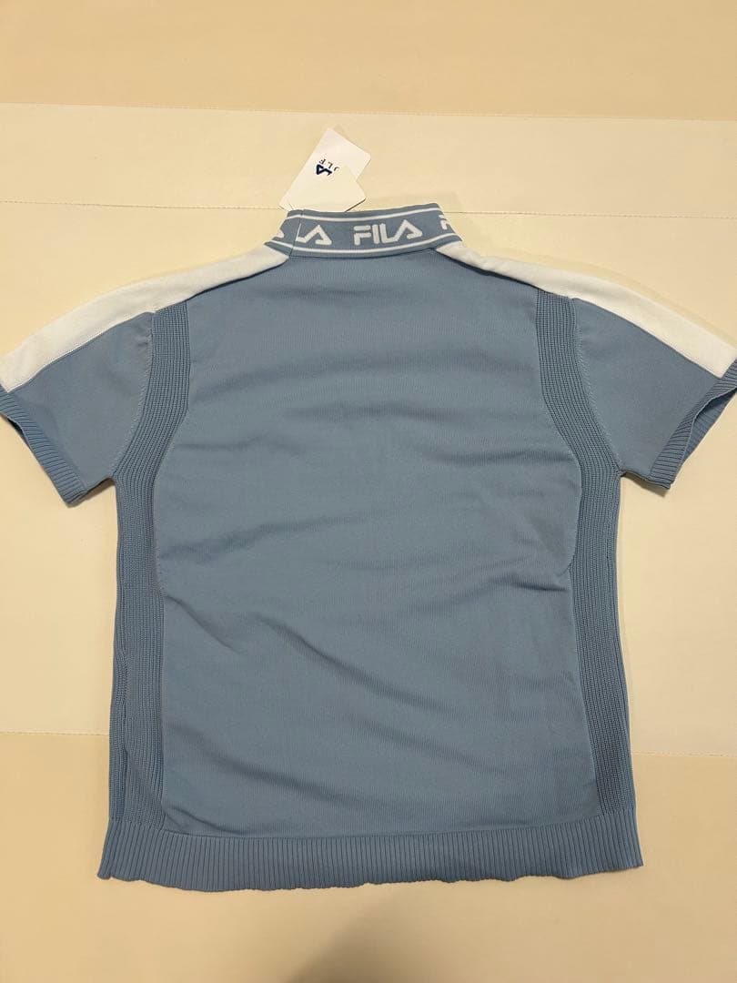 新品タグ付き　FILA ブルー 半袖ニット　立ち襟　ライトブルー