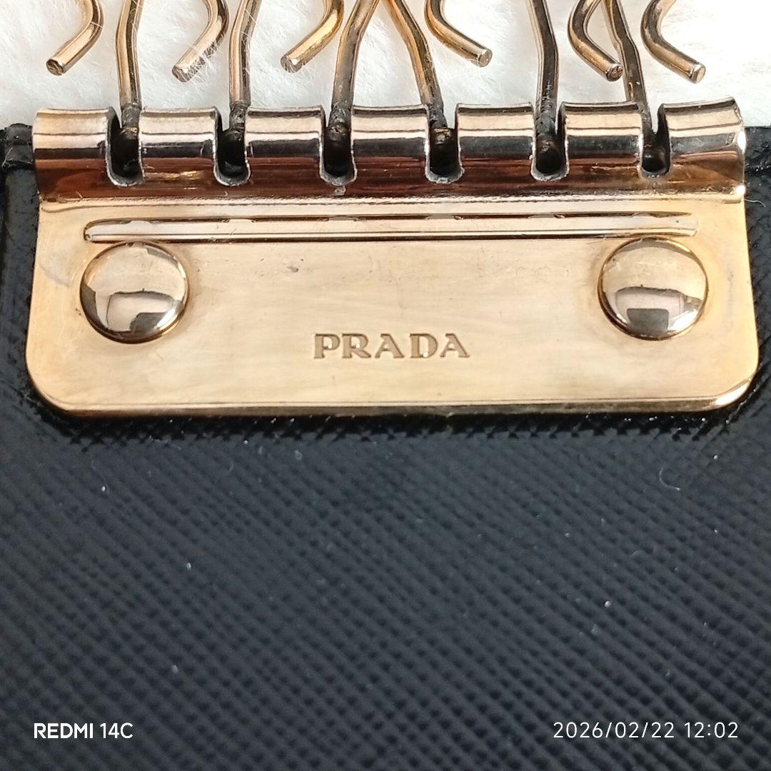 【PRADA】ゴールドロゴリボン6連キーケース ブラックネロサフィアーノレザー