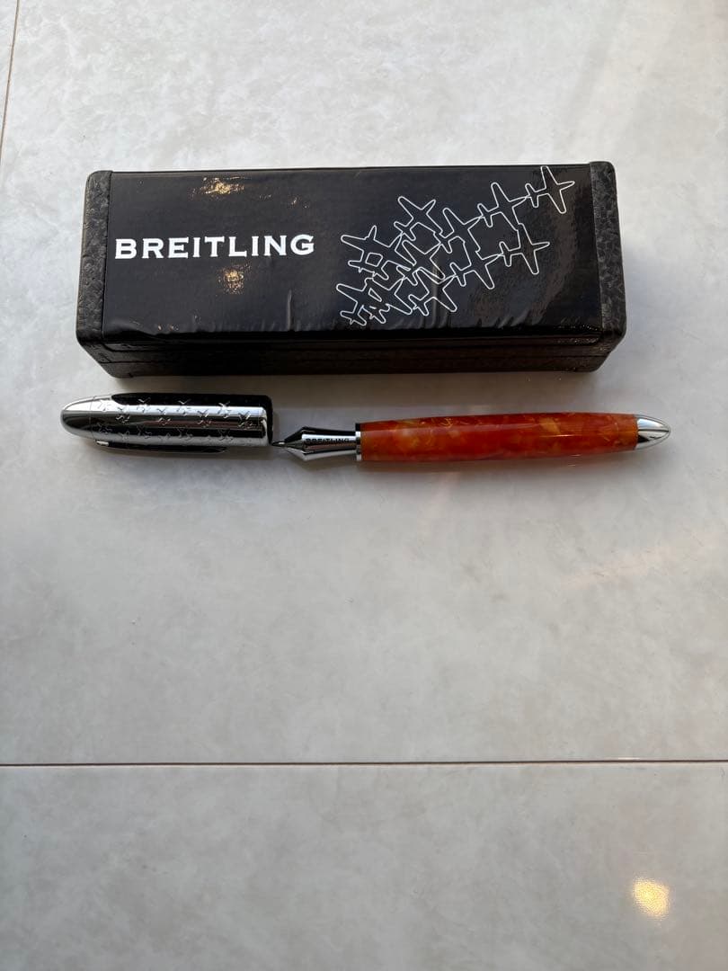 BREITLING ボールペン オレンジ樹脂