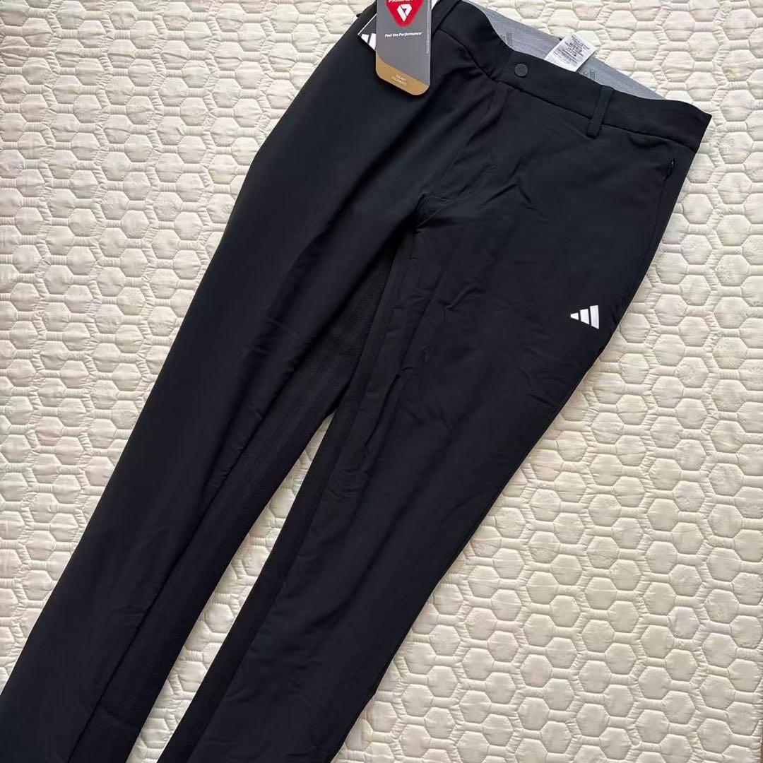 88新品27500円アディダスゴルフ/メンズ/秋冬/中綿ストレッチパンツ/黒