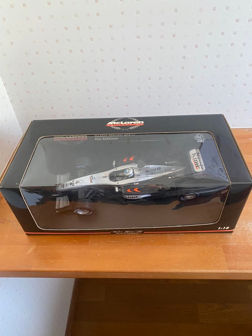 ミニチャンプス MP4-17 キミ・ライコネン1/18 ミニカー