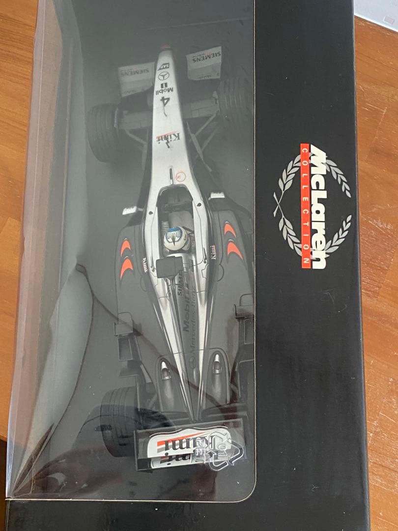 ミニチャンプス MP4-17 キミ・ライコネン1/18 ミニカー