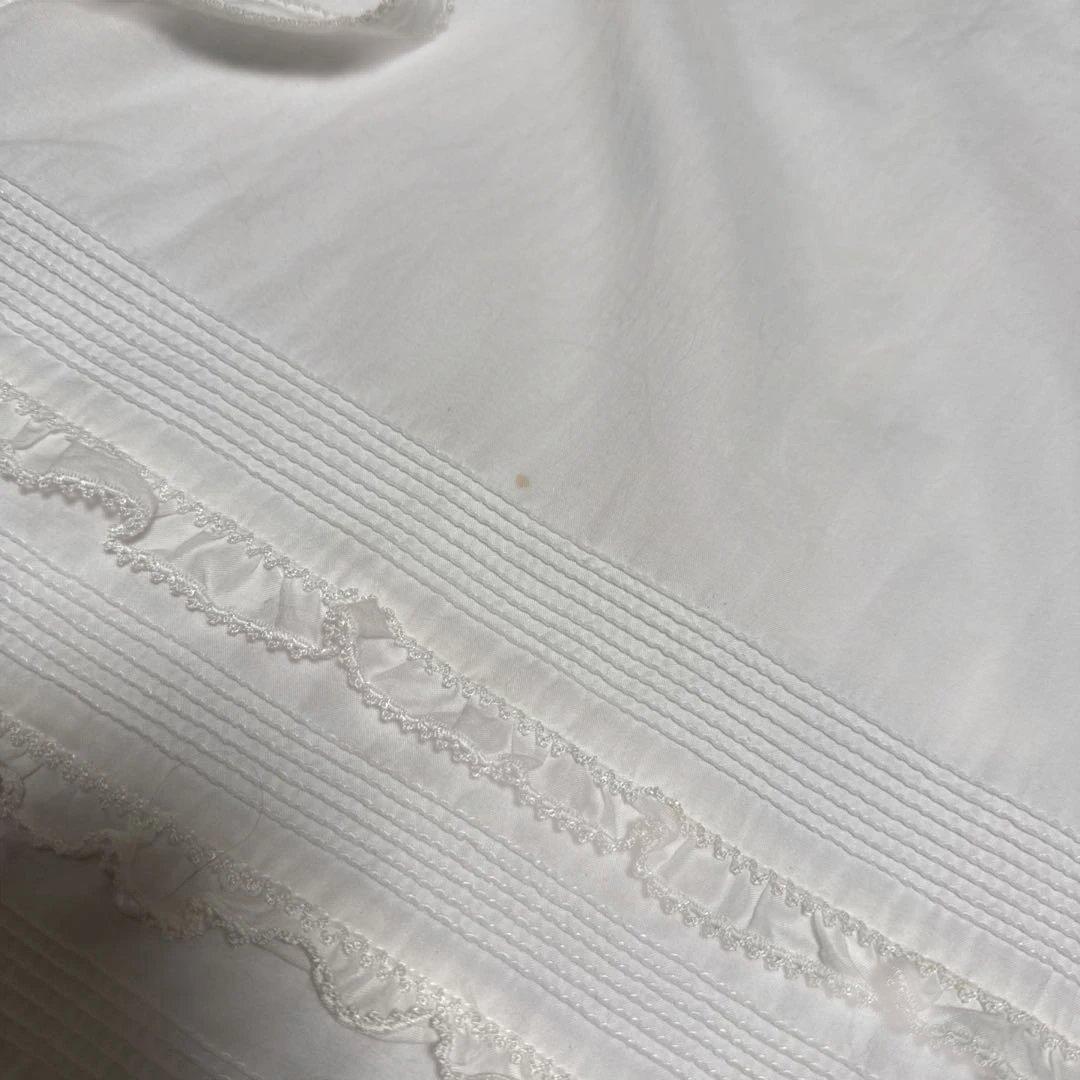 ワンダフルワールド エプロン　白