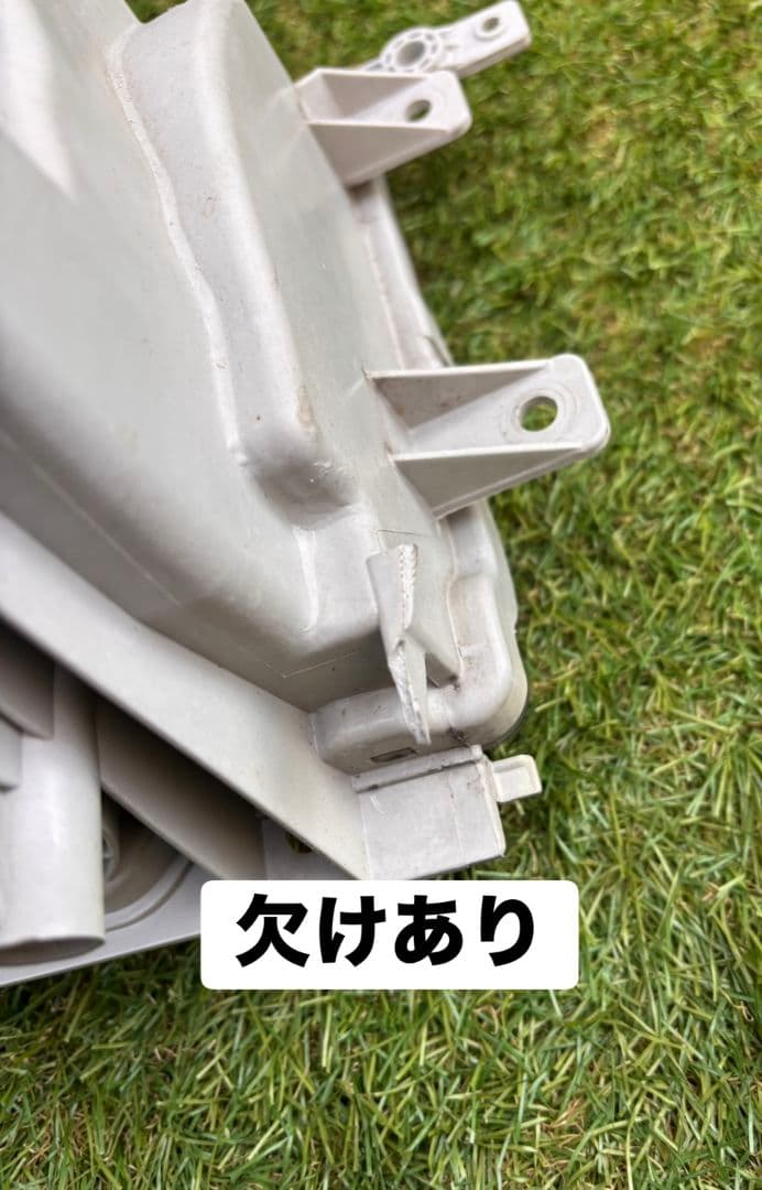 いすゞ エルフ 左ヘッドライト KOITO 110-21885