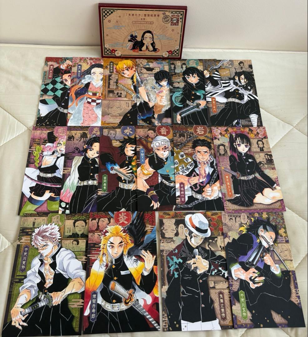 鬼滅の刃全巻＆特装版缶バッチ・シール・ポストカード＆キャラブック＆見聞録セット