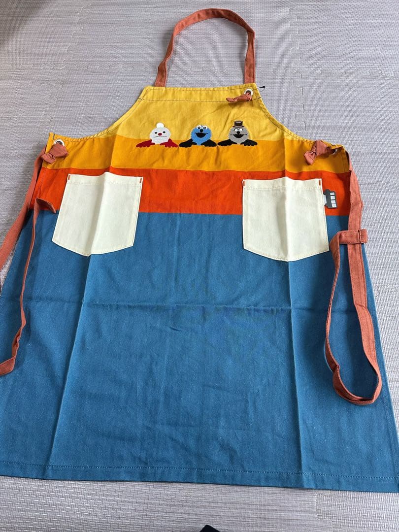 新品未使用　niko and…ニコアンド　パペットスンスン　エプロン オレンジ系