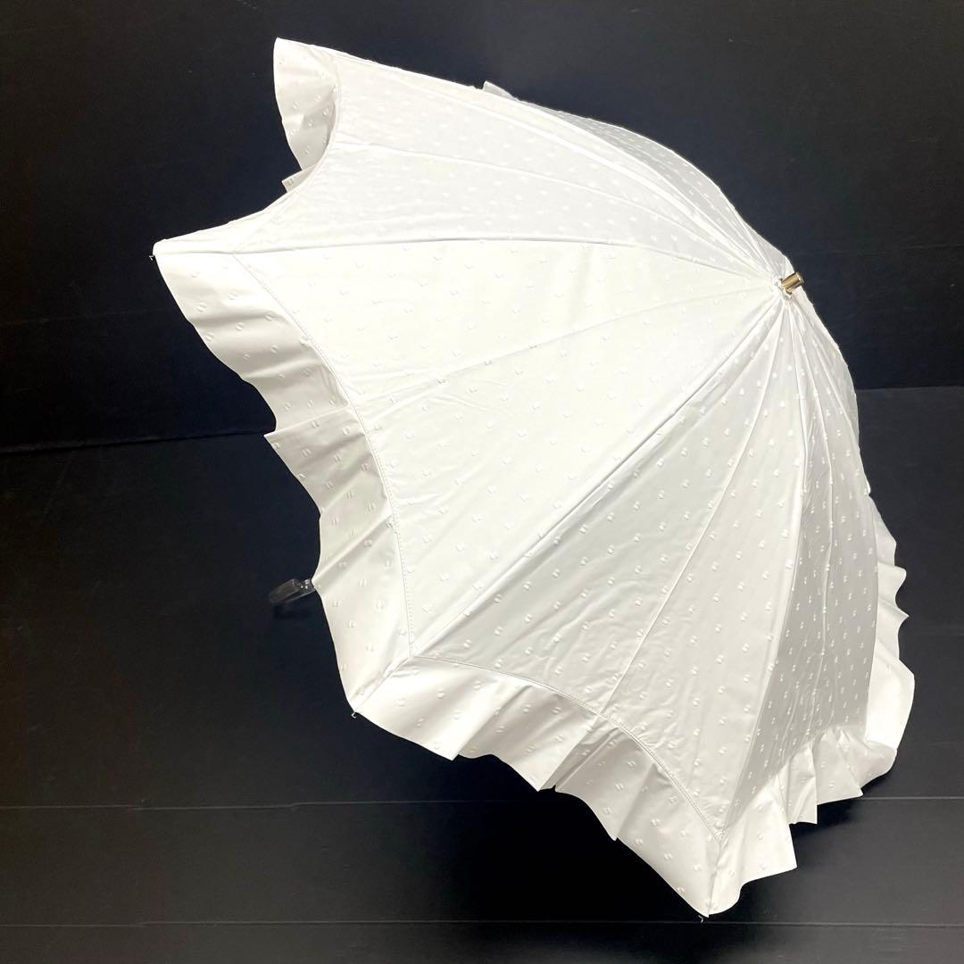お*ん様 新品52930 ケイトスペード＊白ホワイトフリル1級遮光晴雨兼用日傘雨