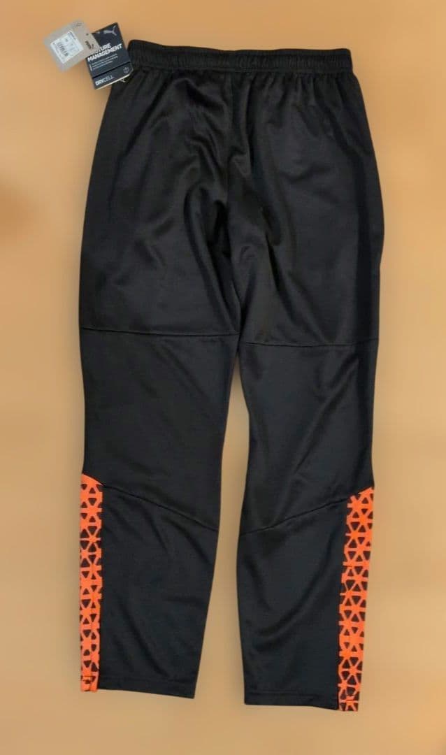 新品　サイズ160 PUMA ジュニア セットアップ 黒/オレンジ