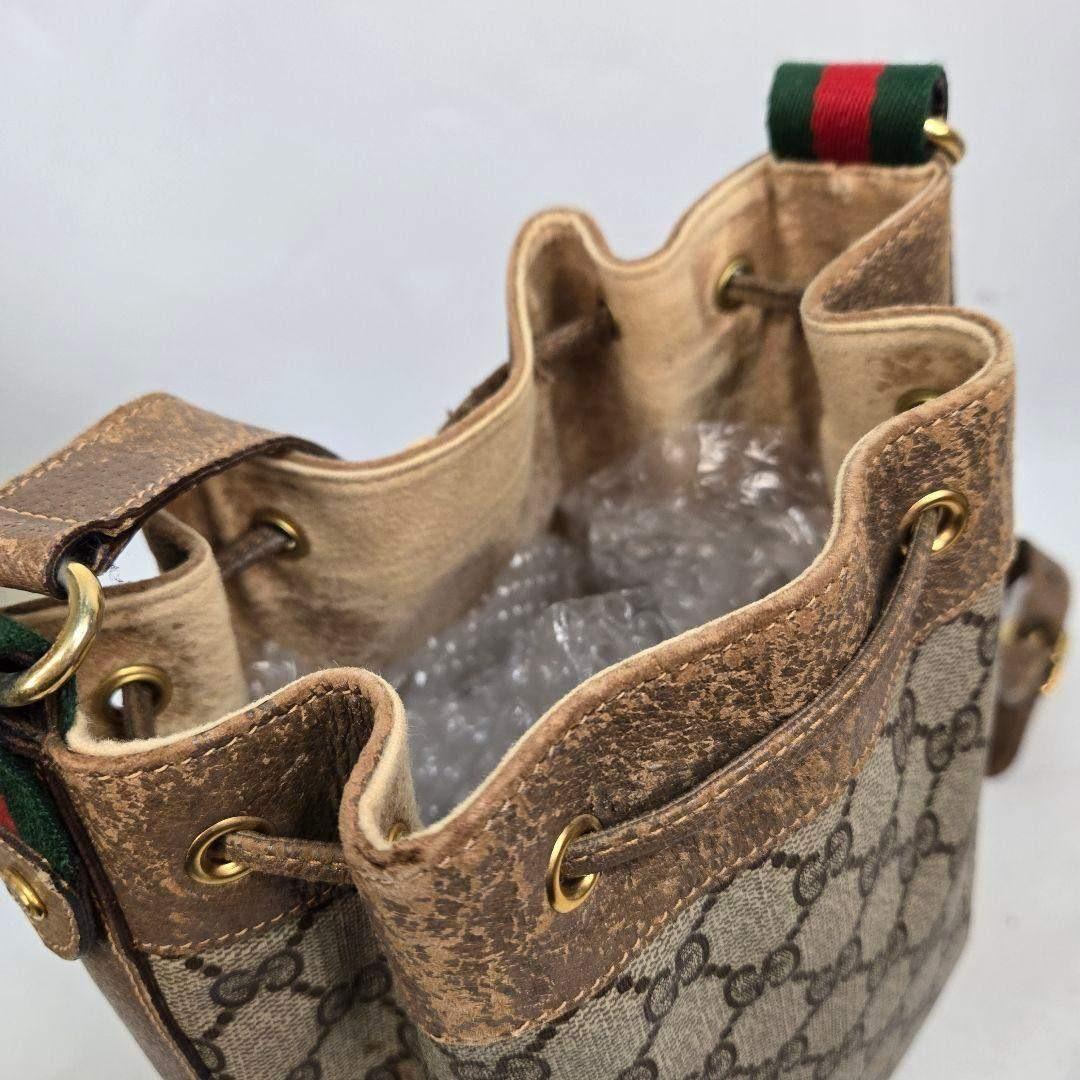 GUCCI ショルダーバッグ 巾着型 GGスプリーム シェリーライン