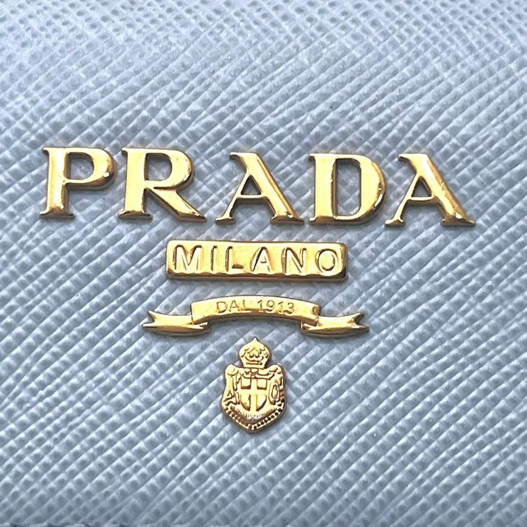 プラダ PRADA サフィアーノ キーケース 4連 水色 箱付き　0125-③