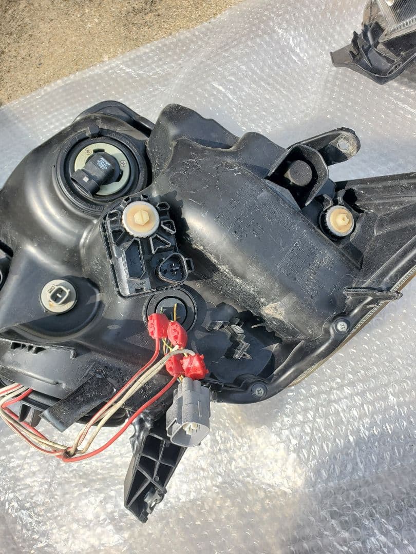 タントカスタム la600s イカリングヘッドライト 破損あり ジャンク