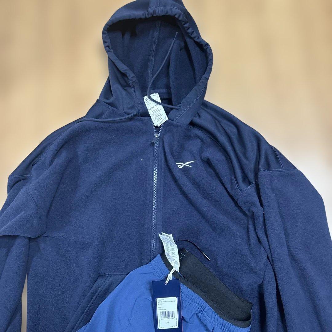新品未使用Reebok ネイビーフルジップパーカー　ストレッチカーゴセットアップ