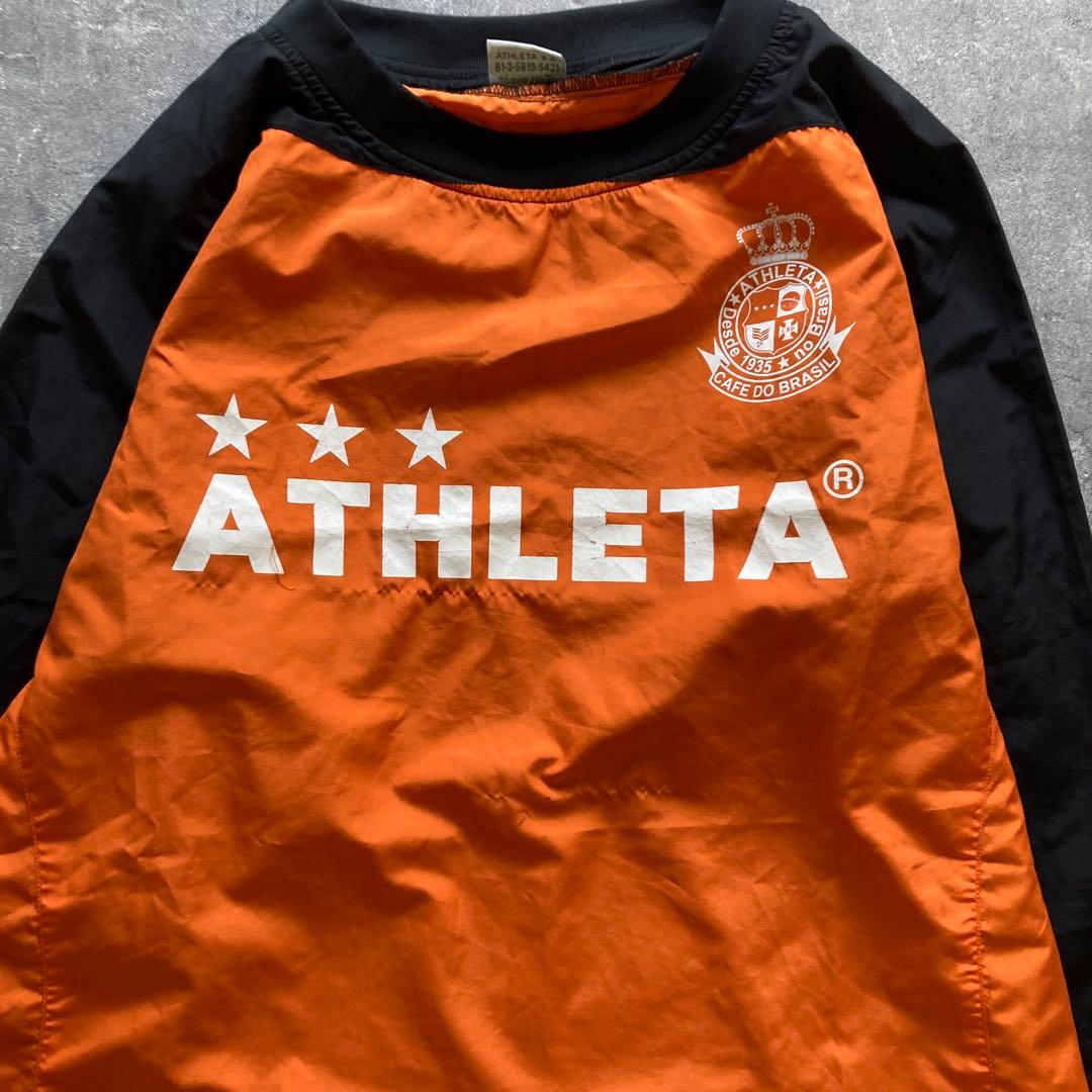 ATHLETA ピステ上下 セットアップ　オレンジ/ブラック　Lサイズ